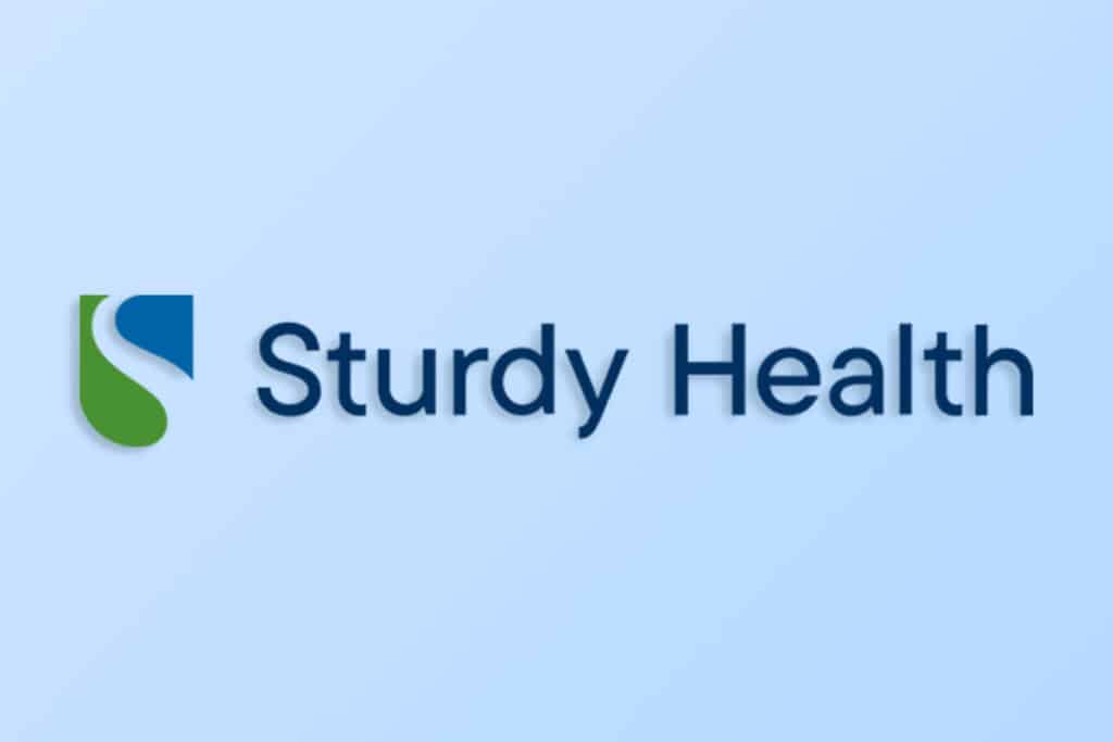 Sturdy Health Logo With A Blue Background